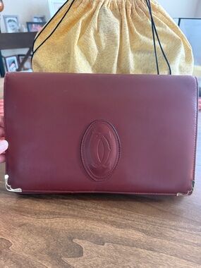 Vintage Burgundy Leather Clutch with Embossed Logo